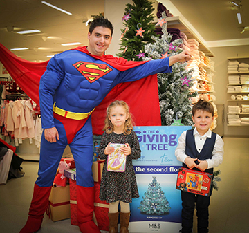 Superman aka Rick Gordon took some time out from saving the world to help four year old Olivia Blair and three year old Ksawier Pal launch the 2017 Giving Tree, a cross-community initiative run by Belfast Central Mission and the Society of St Vincent De Paul and supported by Marks and Spencer to help local children in need have a happier Christmas.  The Giving Tree, which will be in Marks and Spencer Donegall Place Belfast, from 26 November to 9 December, gives members of the public an opportunity to donate a toy or gift for a local child with the gifts being divided equally between SVP and BCM before being distributed to families in the weeks leading up to Christmas.