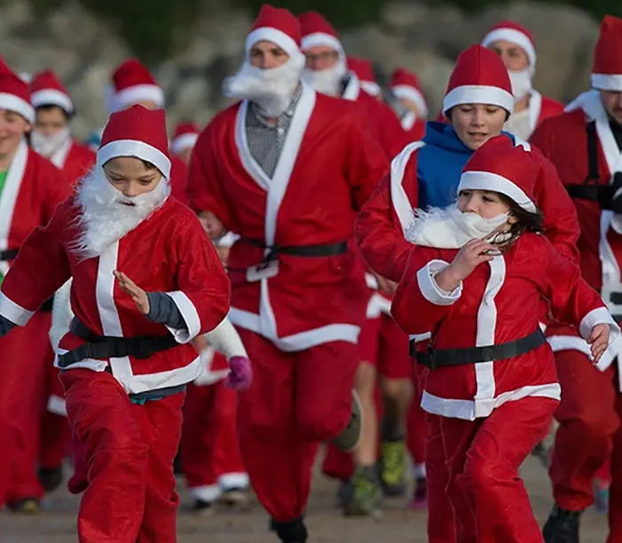 A group of santas running